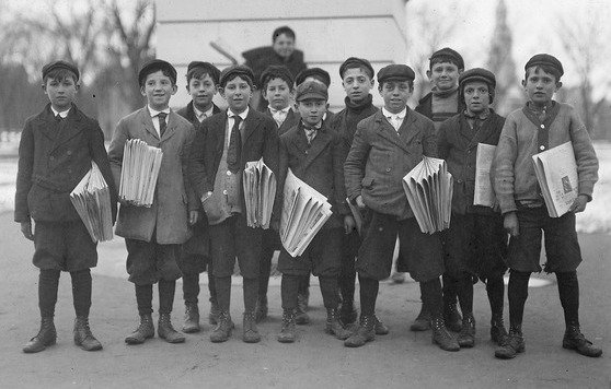 old black-and-white photo of newsboys